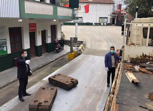 圖為數(shù)字化地磅使用現(xiàn)場